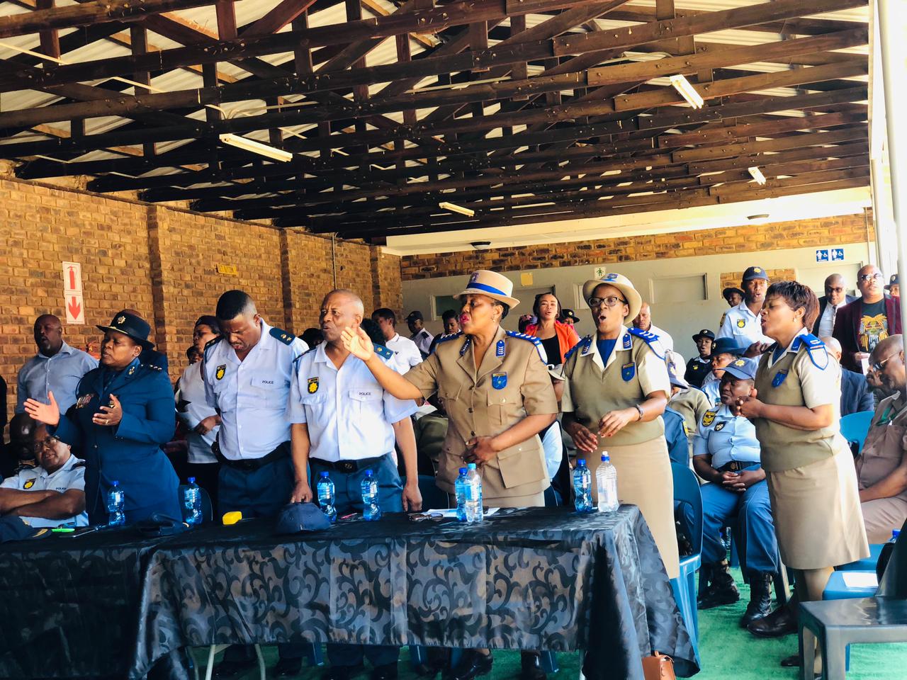 Community, police and traffic officers unite in prayer to fight crime