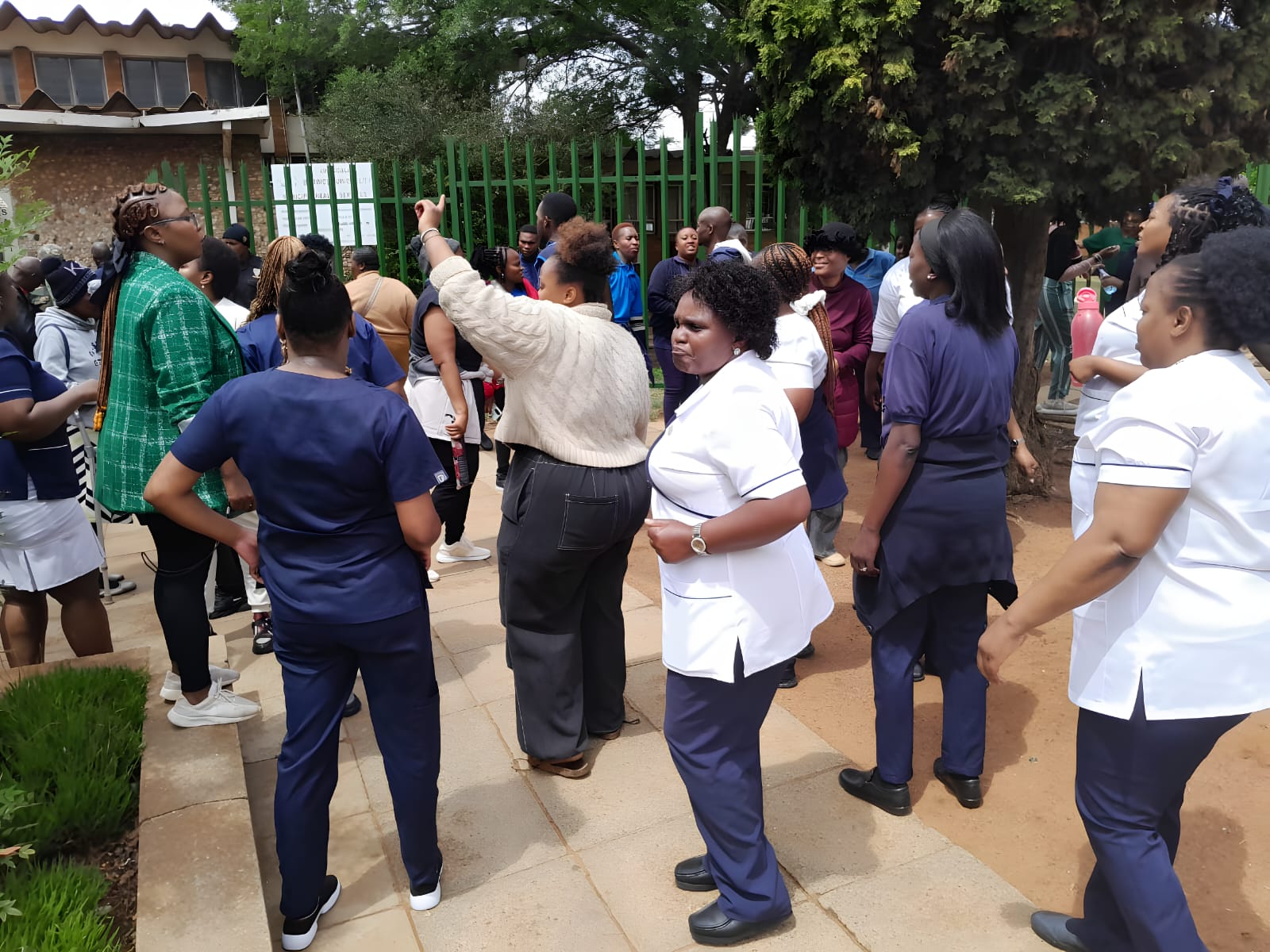 Healthcare workers protest water shortage at Bernice Samuel Hospital in Delmas