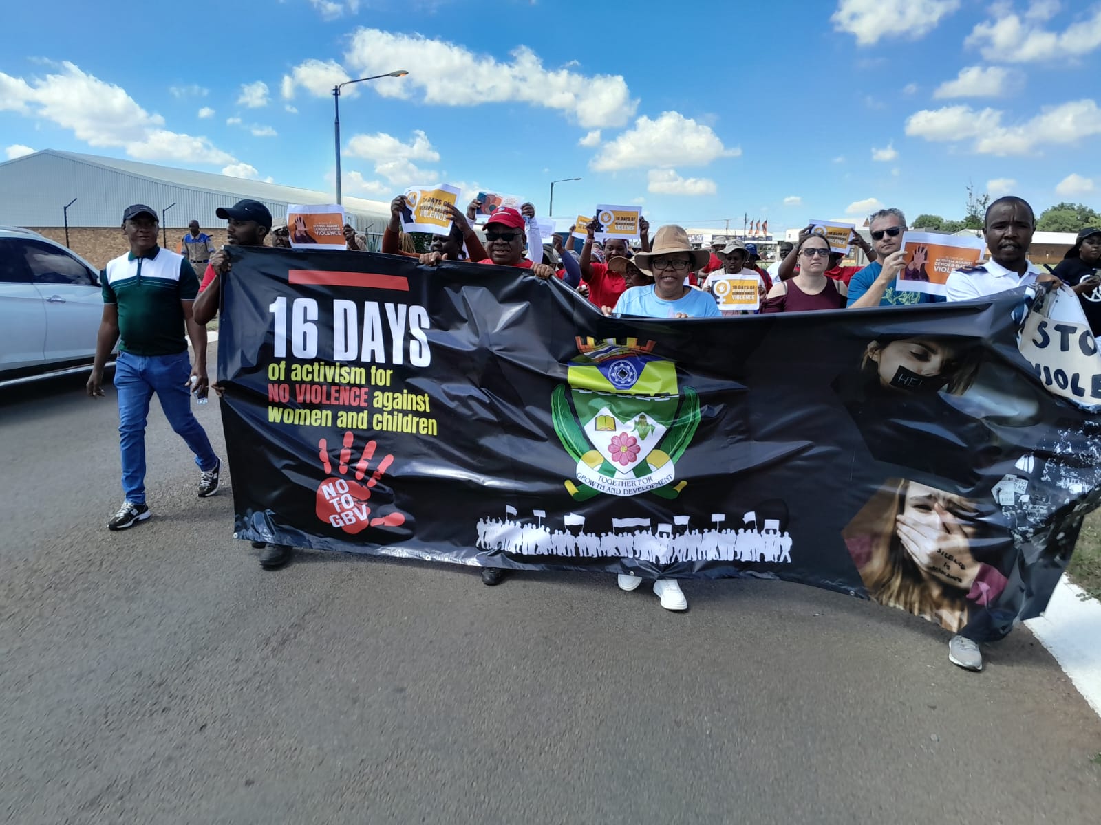 Victor Khanye community walks for change, stands united against GBV